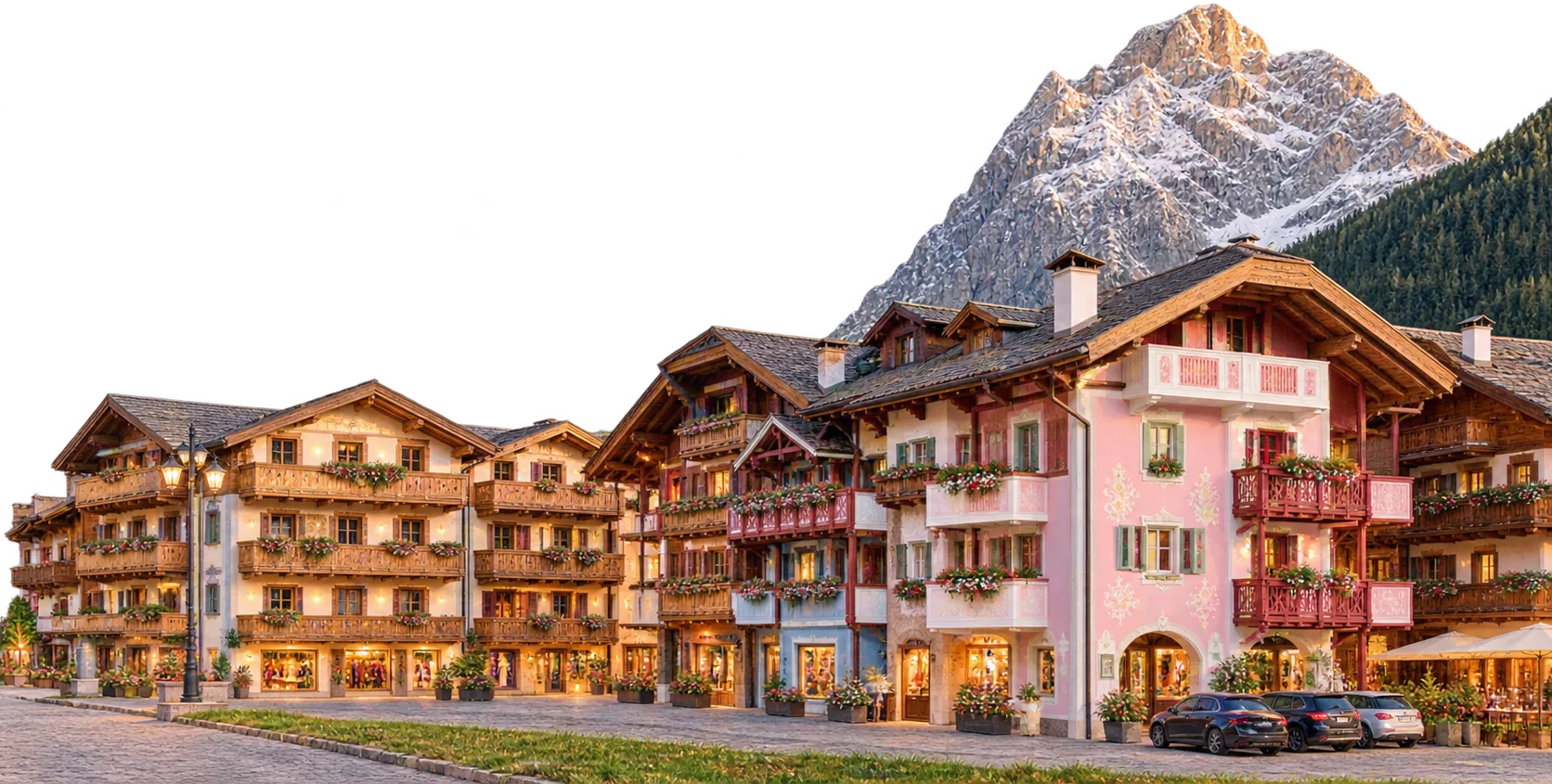 Dorf mit bemalten Häusern am Fuß eines Dolomitengipfels